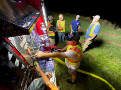 Firefighters Drafting water